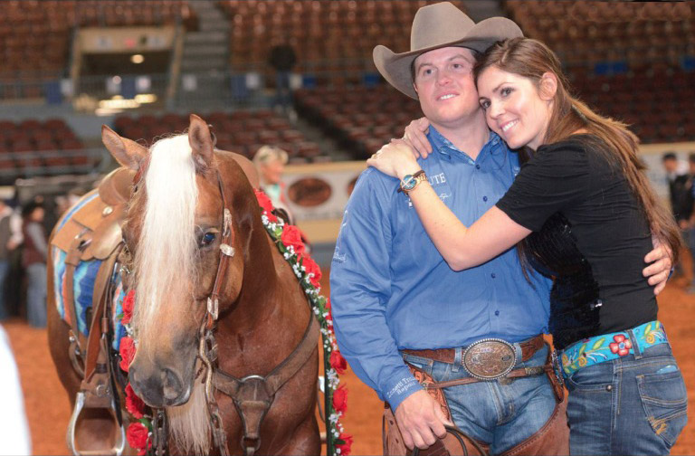 Casey and Nicole Deary with a palomino horse