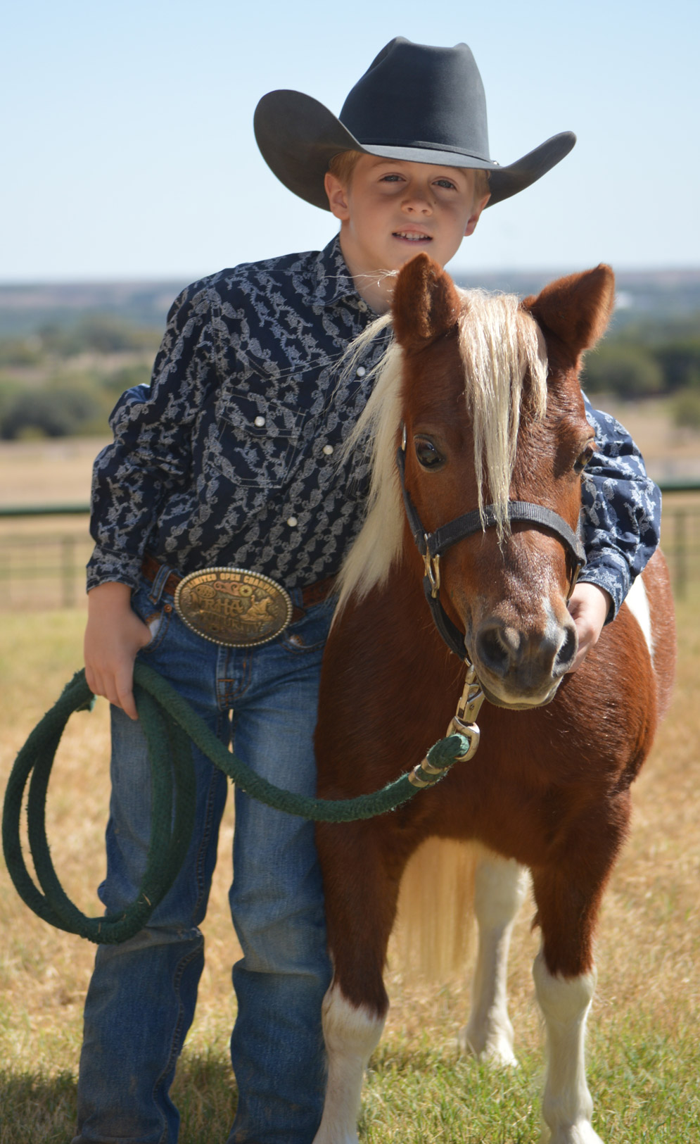 One of the Deary boys with his pony