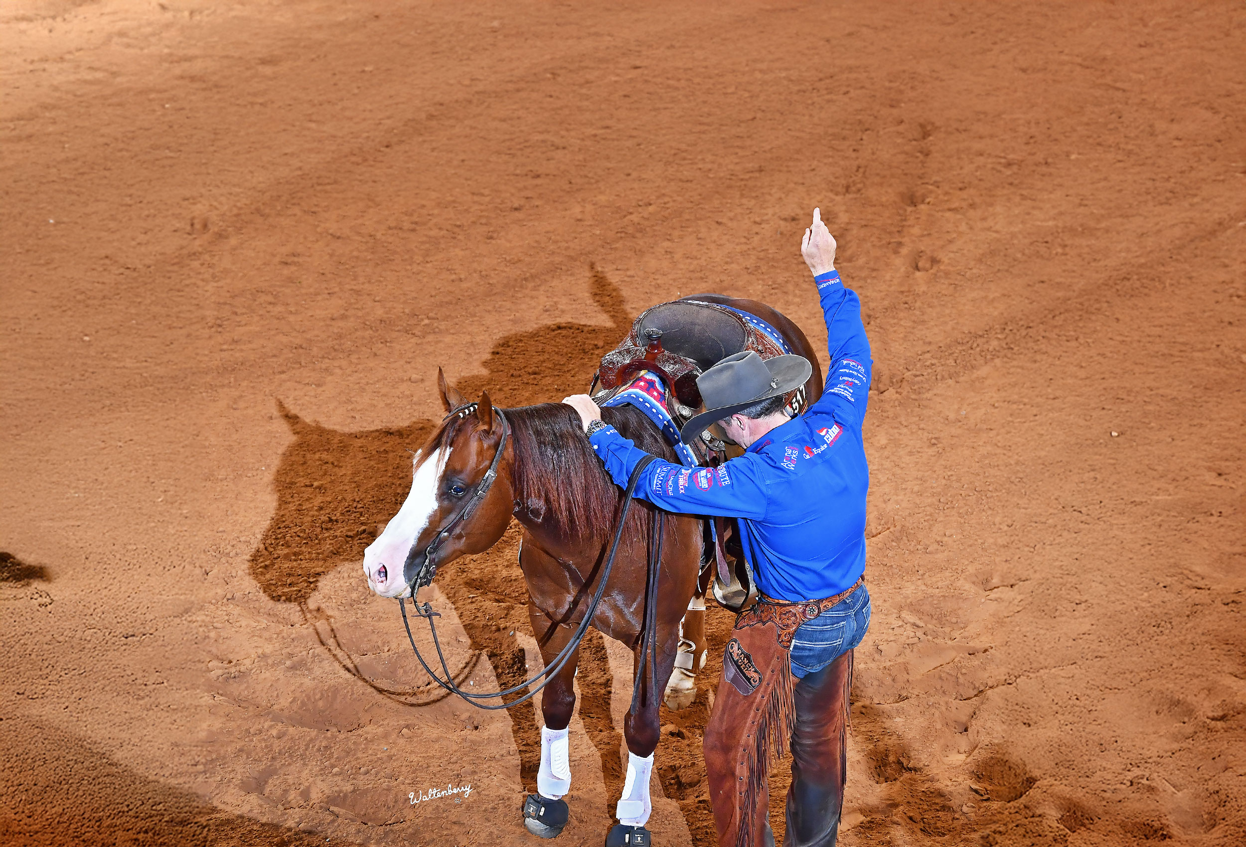 Casey Deary on Belissimo after the winning run at the 2025 NRHA Futurity